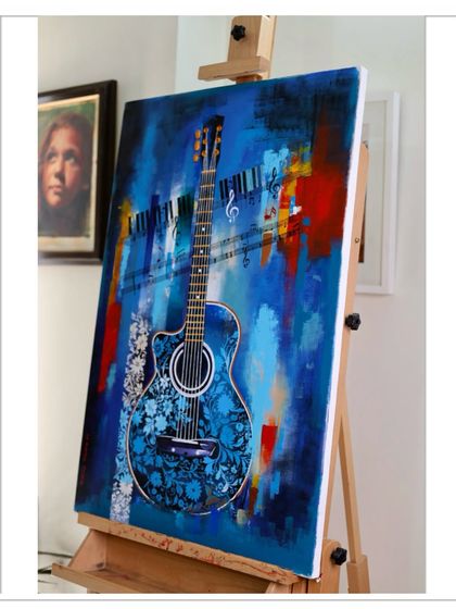 An abstract acrylic on canvas painting commissioned for a music lover. The client wanted a vibrant piece that combined a floral-patterned guitar with musical elements like a keyboard and notes.
