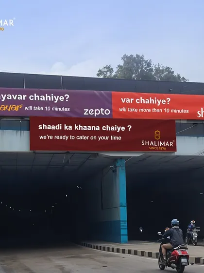 A look at our playful and timely marketing. This billboard cleverly plays on popular brand campaigns to highlight that when you need "shaadi ka khaana," we are ready to cater on your time.