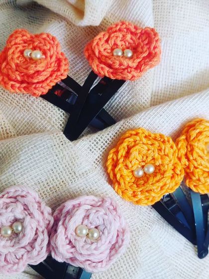 Another combination of my floral hair clips, showing the variety of warm and soft colors available.