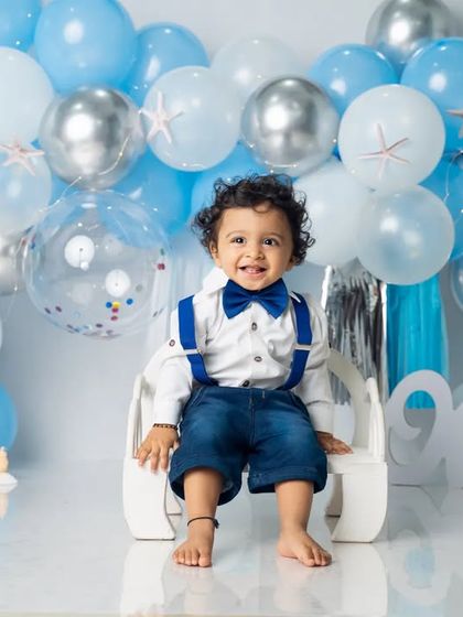 A classic portrait of the birthday boy. We always take time to capture simple, beautiful shots before the messy fun of the cake smash begins.