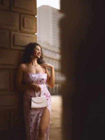 Using the city's architecture to frame a portrait. I love finding interesting angles and pockets of light to create a dreamy, editorial look even in an urban setting.