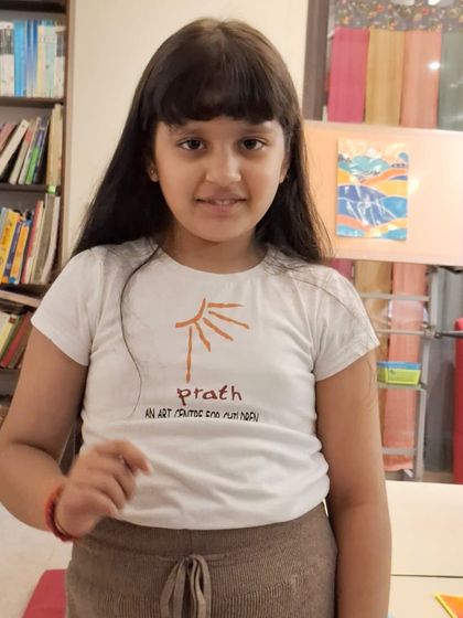 Another one of my wonderful students proudly wearing her Prath t-shirt. It's more than just a logo; it's a symbol of our shared journey in art and creativity.
