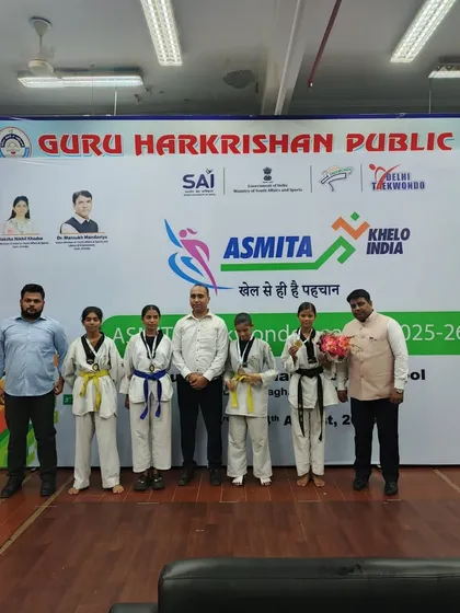 My students and I at the ASMITA Khelo India Taekwondo event. It is always rewarding to see them recognized for their skills.