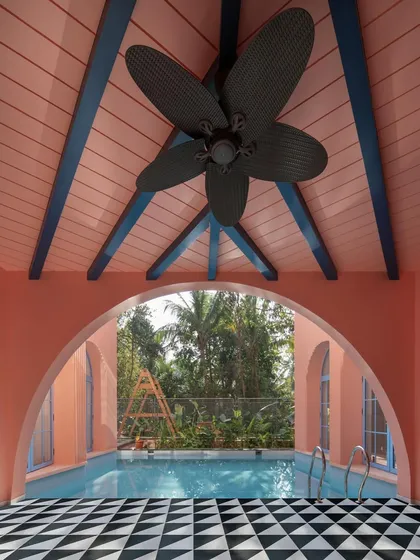 An arch frames a view, creating a deliberate moment of focus. Here at Baia Villas, the archway over the pool frames the lush tropical landscape, creating a living painting and a tranquil space for reflection.