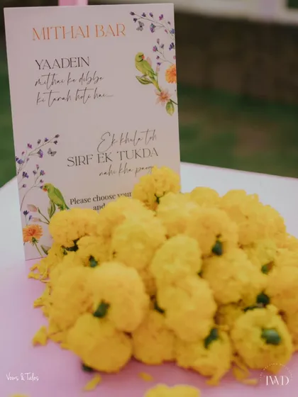 A cute sign at the Mithai Bar reads, "Yaadein mithai ke dibbe ki tarah hoti hain... Ek baar khula toh sirf ek tukda nahi kha paoge." (Memories are like a box of sweets... once you open it, you can't have just one piece).