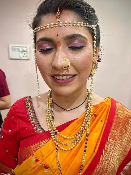 A close-up of the eye makeup for this Peshwai look. I used shimmery pink and purple tones to complement the colors in her saree.