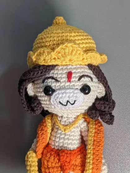 A straight-on portrait of the Lord Hanuman doll.