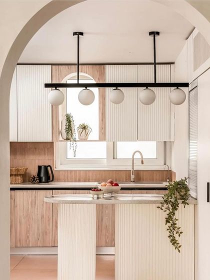 A look at the "Marshmallow" kitchen, as featured by FOAID, showcasing its clean lines and soft, powdery palette.