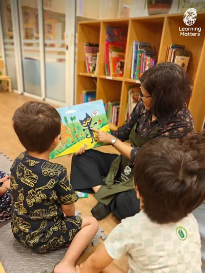 Storytime is a sacred space in our day. With eyes full of wonder, children gather to listen, imagine, and travel to new worlds. This shared experience builds vocabulary, listening skills, and a lifelong love of stories.