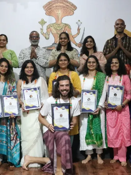 A proud moment for our 300-hour TTC graduates. This photo captures the sense of community and shared accomplishment.