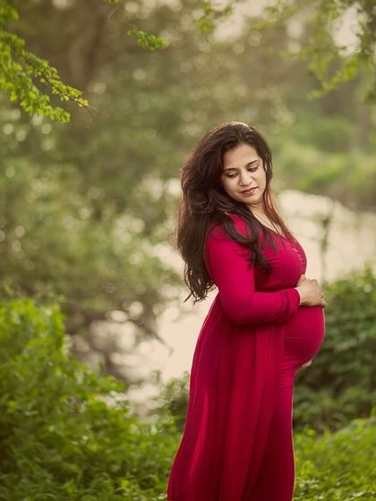 A moody and soulful portrait taken during the monsoon season. The diffused light and deep red gown create a rich, dramatic look that I absolutely love for capturing raw emotion.