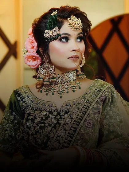 A beautiful bride in a green and gold lehenga, showcasing a different color palette for bridal wear.