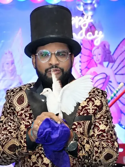 A dove appears from a silk handkerchief, a classic and elegant piece of magic. This is a beautiful illusion that adds a touch of class to any event.