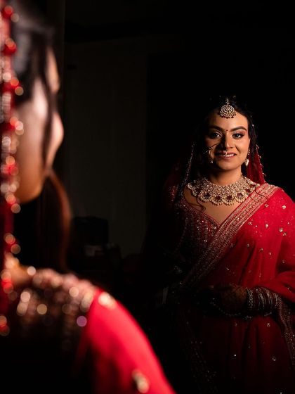 Portraits of my bride Sameera. I created a beautiful look that complemented her dusky skin tone and classic red lehenga.