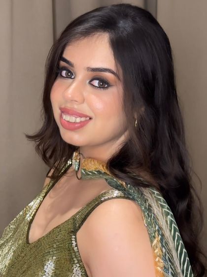 The eyes and the glow are stealing the show. This is a perfect example of how to do glam makeup that still feels soft and sophisticated.