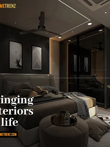 Bringing interiors to life. This bedroom design uses a dark, dramatic color palette, with accent lighting and framed art to create a sophisticated and moody atmosphere.