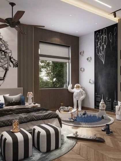 This space-themed bedroom is designed to inspire adventure. A large astronaut mural dominates one wall, while a chalkboard wall encourages creativity. The room is filled with playful elements like a yeti figure and a skateboard, making it a perfect kid's retreat.