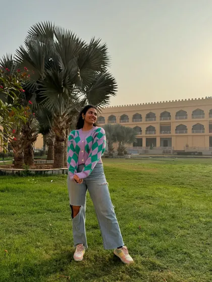 A cute and cozy look for a slightly chilly evening in Rajasthan. I paired a lilac and green argyle cardigan with my go-to jeans.