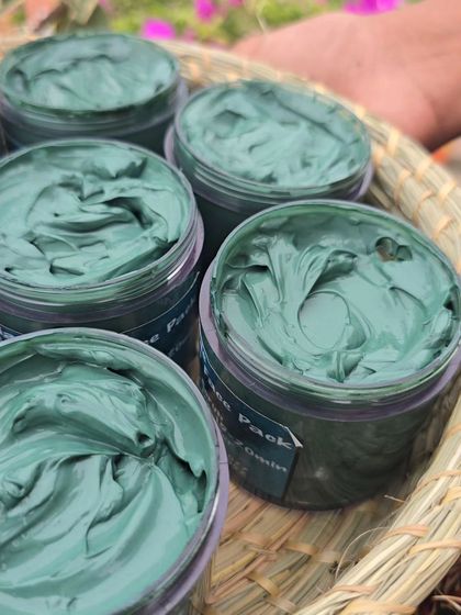 A close up on the smooth, rich texture of the Charcoal Face Pack. It spreads easily on the skin for an even application.