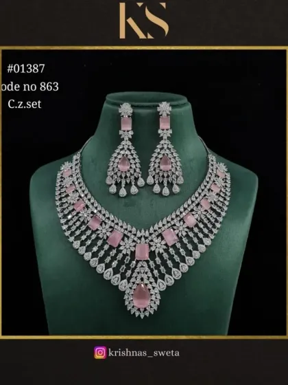 A soft pink version of the C.Z. set. This is a feminine and romantic option, perfect for a bridesmaid or for a daytime event.