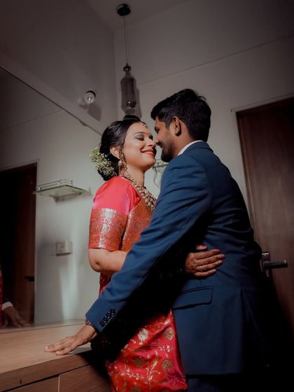 A romantic, candid moment between the couple at their reception. These quiet moments amidst the celebration are incredibly special.