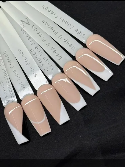 The French manicure is versatile, and I love exploring all its forms. This chart shows some of the different styles I can do, from the classic smile line to more modern V-cut and side-edge designs, helping you find your perfect look.