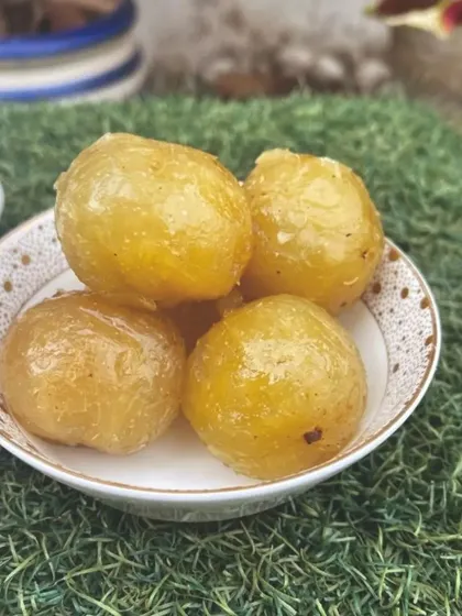 A close up of our Dry Amla Murabba pieces. Each piece is carefully prepared to be soft and chewy, offering a delightful burst of sweet and tangy flavour.