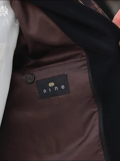 A look inside one of our jackets. The quality of the lining and the clean internal stitching are just as important as the exterior for ensuring comfort and durability.