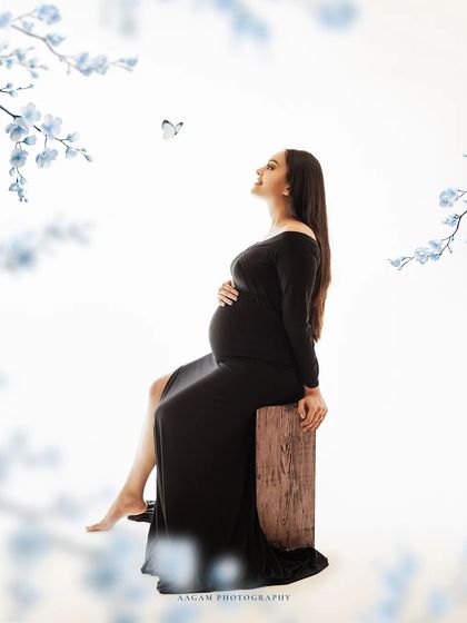 A touch of magic with a butterfly, symbolizing transformation and the beautiful new beginning of motherhood.