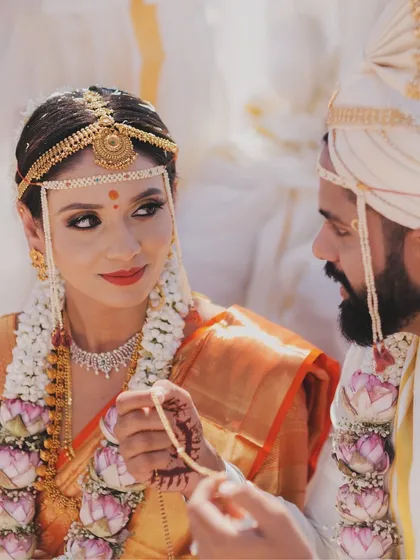 A quiet glance during a South Indian wedding ceremony. It's these unscripted, in-between moments that often tell the most powerful stories, reflecting a deep connection amidst the traditional rituals.