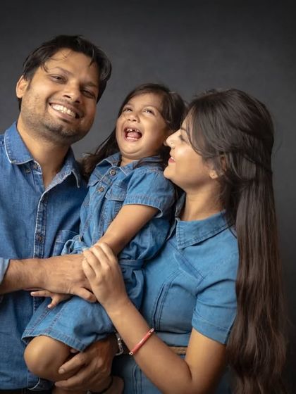 Pure, uninhibited laughter. This is the kind of moment I strive to capture in every family photoshoot, a memory of pure joy.