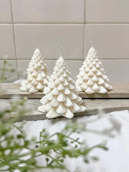 Christmas is here. Our classic pine tree candles are a beautiful and timeless addition to your holiday decor.