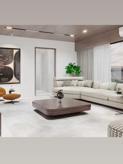 This minimalist living room design focuses on clean lines and a calm, uncluttered aesthetic. The space is defined by a neutral color palette, a comfortable sectional sofa, and large windows that flood the room with natural light.