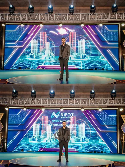 Commanding the stage at the 10th-anniversary celebration for NIFCO. A powerful stage presence is key to holding the audience's attention and ensuring a seamless event flow, no matter the scale.