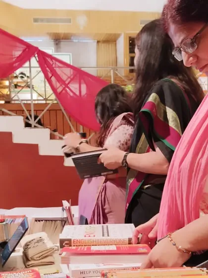 Teachers and parents browsing our curated selection. We bring a wide range of books to our school fairs, ensuring there's something for every age and interest.