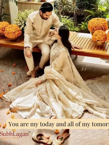 A romantic moment between a couple, surrounded by marigold flowers. We help create matches where every day feels like a celebration of love.
