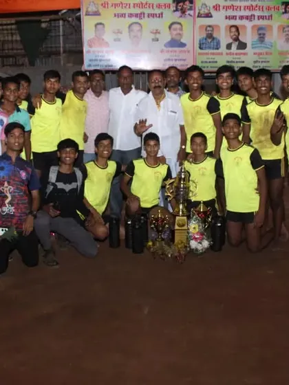 The full sub-junior squad with coaches and their collection of trophies after winning the tournament.