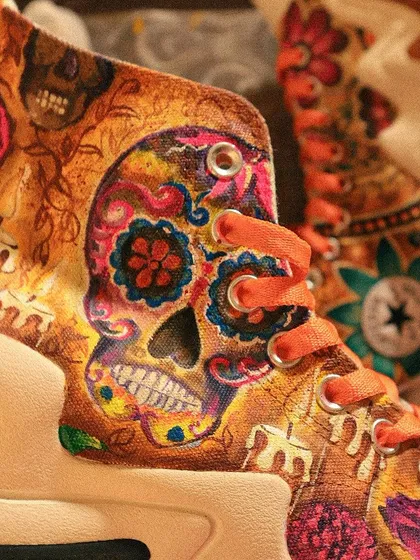 This one was a blast to create. I painted these Converse Run Star Motion sneakers with a vibrant, detailed sugar skull design. The complex patterns and bold colors pop against the unique silhouette of the shoe, creating a statement piece that’s impossible to ignore.