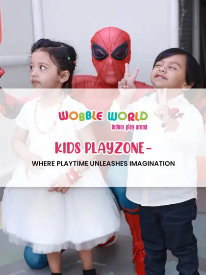 Two children posing with Spiderman, one giving a peace sign. Our playzone is where playtime unleashes imagination.