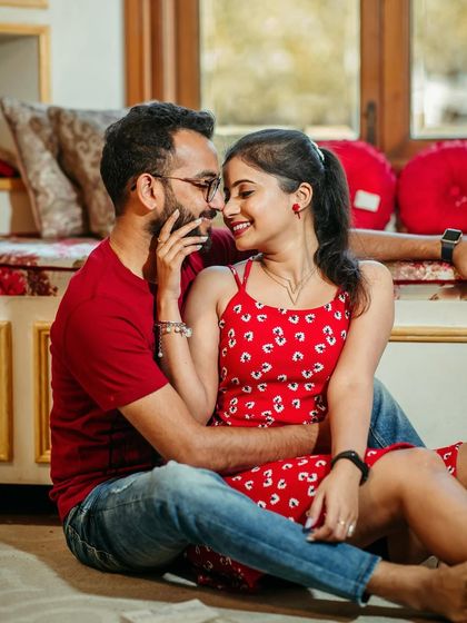 An intimate and sweet moment. The makeup is soft and enhances her features, letting the couple's connection be the focus.