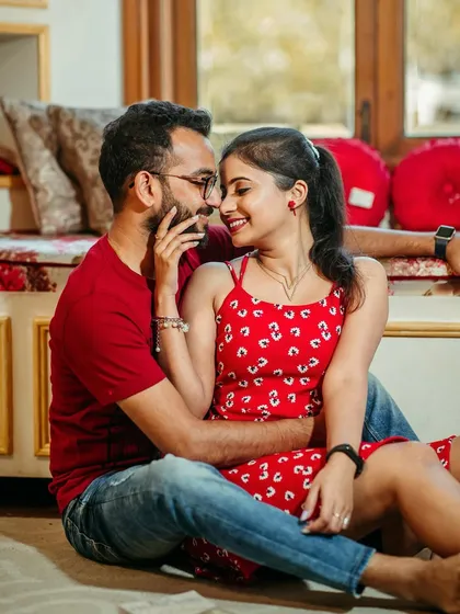 An intimate and sweet moment. The makeup is soft and enhances her features, letting the couple's connection be the focus.