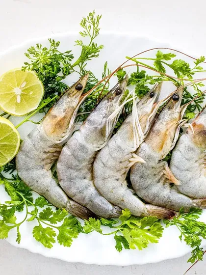 Making raw food look this fresh and appealing is a challenge I enjoy. Here, I used a bright and clean lighting setup to showcase these beautiful raw shrimp, garnished with fresh cilantro and lemon. This high-key photography style is perfect for e-commerce brands and restaurant menus that need to convey freshness and quality.