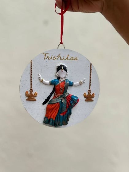 Another view of the custom wall decor for the Bharatanatyam dancer. Each element is carefully sculpted and placed to create a balanced and beautiful composition.