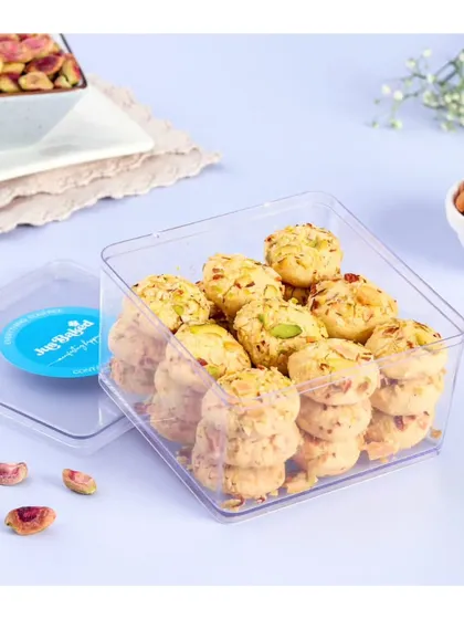 Our Nankhatai Minis, made with pure ghee and crusted with pistachios and almonds. We made these for Holi, inspired by the treats our grandmoms used to make.