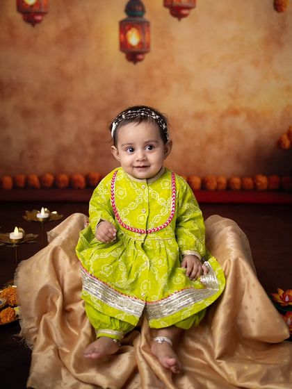 A sweet and curious look from this little one during her first Diwali photoshoot.