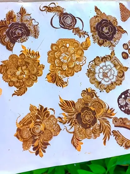 A collection of different flower styles I've practiced. From roses to hibiscus, I can create a variety of floral looks for you.