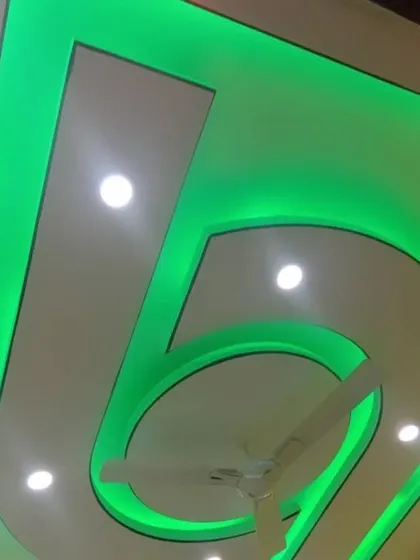 A simple but effective design using bright green LED lighting. The central cutout is designed to accommodate a ceiling fan.
