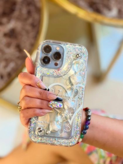 This angle highlights the intricate detail of our 3D nail art, showing how the light catches the different facets of the crystals. Each stone is individually placed to create a design with incredible depth and sparkle.