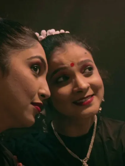 A reflective pose from our Navratri performance piece. The image captures the deep connection and storytelling aspect of dance, where every glance and expression has a meaning.