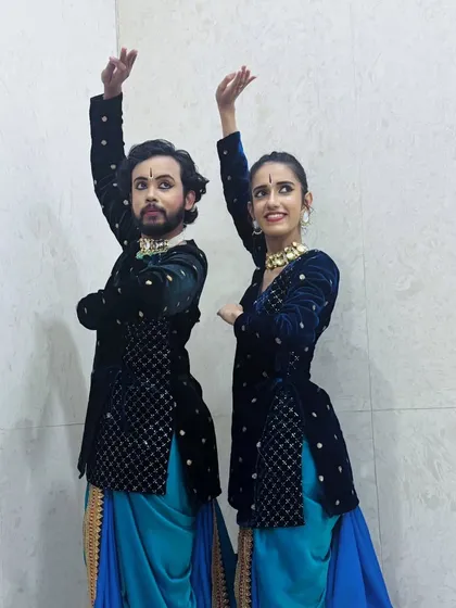 Another synchronized pose from our Kathak ensemble piece. The precision in our posture and alignment is a key part of creating a visually stunning performance.